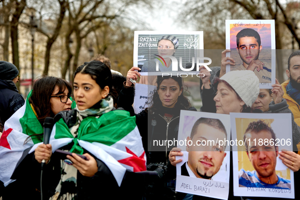 Members of the Syrian community gathered in solidarity with the victims of Bashar al-Assad's prisons in Syria at Place de la Bastille in Par...