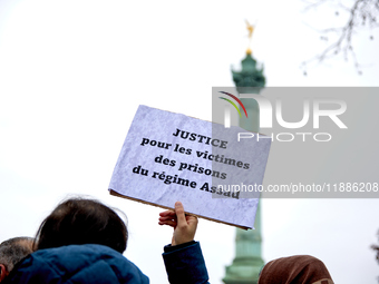 Members of the Syrian community gathered in solidarity with the victims of Bashar al-Assad's prisons in Syria at Place de la Bastille in Par...