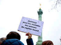 Members of the Syrian community gathered in solidarity with the victims of Bashar al-Assad's prisons in Syria at Place de la Bastille in Par...