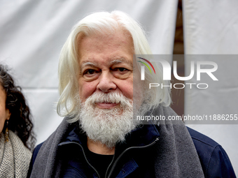 Paul Watson, founder of the Sea Shepherd Conservation Society and anti-whaling activist, attended a rally in his support at Place de la Repu...