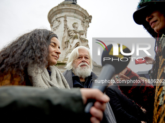 Paul Watson, founder of the Sea Shepherd Conservation Society and anti-whaling activist, attended a rally in his support at Place de la Repu...