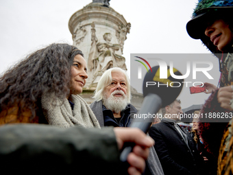 Paul Watson, founder of the Sea Shepherd Conservation Society and anti-whaling activist, attended a rally in his support at Place de la Repu...