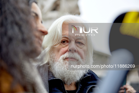 Paul Watson, founder of the Sea Shepherd Conservation Society and anti-whaling activist, attended a rally in his support at Place de la Repu...