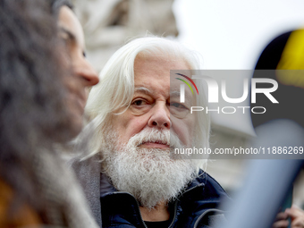 Paul Watson, founder of the Sea Shepherd Conservation Society and anti-whaling activist, attended a rally in his support at Place de la Repu...