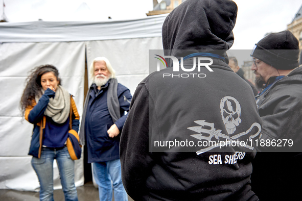 Supporters of anti-whaling activist Paul Watson staged a rally at Place de la Republique in Paris on December 21, 2024, a day after his arri...