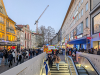 In Munich, Germany, on December 28, 2024, a Johanniter rescue vehicle with flashing blue lights parks on the shopping street Kaufinger Stras...