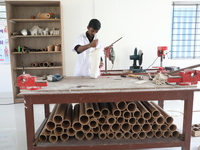 A worker manufactures a prosthetic limb inside the Rehabilitation & Research Centre, a unit of Mahavir Seva Sadan, in Arambag on the outskir...