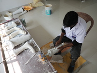 A worker manufactures a prosthetic limb inside the Rehabilitation & Research Centre, a unit of Mahavir Seva Sadan, in Arambag on the outskir...