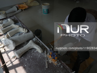 A worker manufactures a prosthetic limb inside the Rehabilitation & Research Centre, a unit of Mahavir Seva Sadan, in Arambag on the outskir...