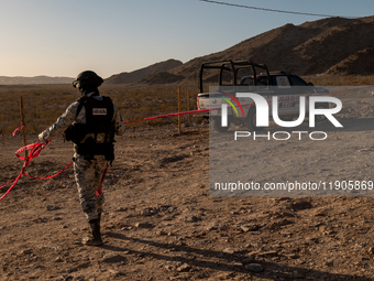 Members of the National Guard secure the area near the site where an immigration officer loses his life after being attacked with rocks thro...