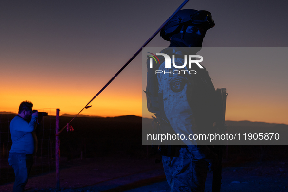 A photographer documents the area near the site where a Mexican immigration officer loses his life after being struck by rocks thrown by mig...