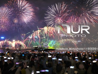 Fireworks explode over Victoria Harbour to mark the arrival of the new year in Hong Kong, China, on January 1, 2025. Hong Kong marks the arr...