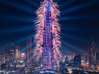 A light show and fireworks illuminate the Burj Khalifa, the world's tallest building, during New Year's Eve celebrations in Dubai on January...