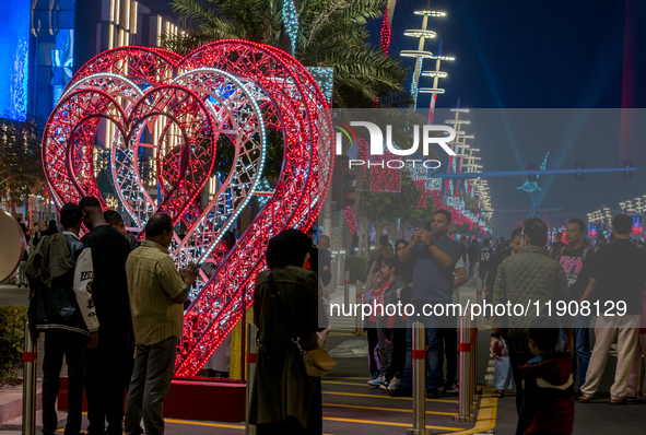 People gather at Lusail Boulevard during New Year's Day celebrations in Doha, Qatar, on January 1, 2025. 