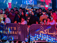 People gather at Lusail Boulevard during New Year's Day celebrations in Doha, Qatar, on January 1, 2025. (