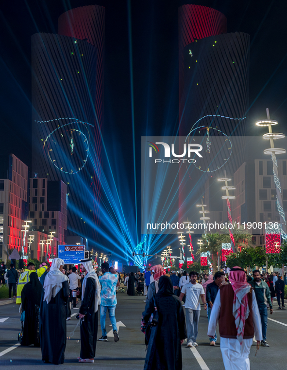 People gather at Lusail Boulevard during New Year's Day celebrations in Doha, Qatar, on January 1, 2025. 