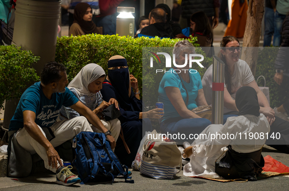 People gather at Lusail Boulevard during New Year's Day celebrations in Doha, Qatar, on January 1, 2025. 