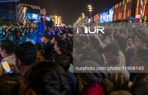 People gather at Lusail Boulevard during New Year's Day celebrations in Doha, Qatar, on January 1, 2025. 