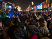 People gather at Lusail Boulevard during New Year's Day celebrations in Doha, Qatar, on January 1, 2025. (