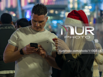 People gather at Lusail Boulevard during New Year's Day celebrations in Doha, Qatar, on January 1, 2025. (