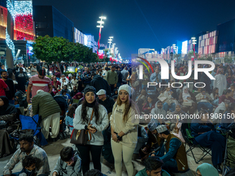 People gather at Lusail Boulevard during New Year's Day celebrations in Doha, Qatar, on January 1, 2025. (