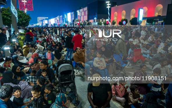 People gather at Lusail Boulevard during New Year's Day celebrations in Doha, Qatar, on January 1, 2025. 