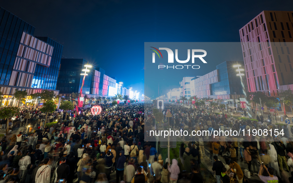 People gather at Lusail Boulevard during New Year's Day celebrations in Doha, Qatar, on January 1, 2025. 