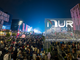 People gather at Lusail Boulevard during New Year's Day celebrations in Doha, Qatar, on January 1, 2025. (