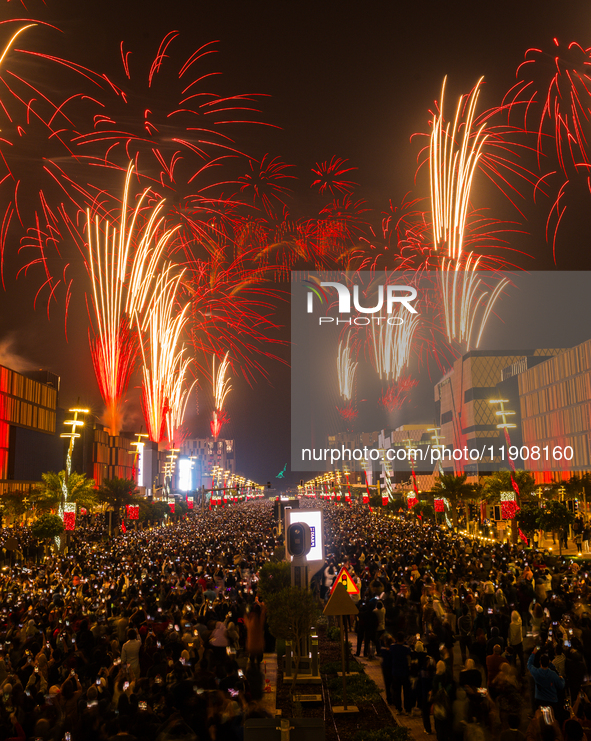 Fireworks and a drone show light up the midnight sky over Lusail Boulevard during the 2025 New Year's Day celebrations in Doha, Qatar, on Ja...