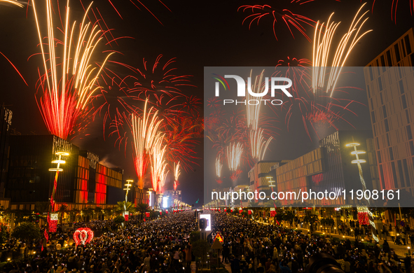 Fireworks and a drone show light up the midnight sky over Lusail Boulevard during the 2025 New Year's Day celebrations in Doha, Qatar, on Ja...