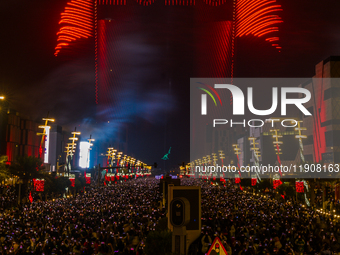 Fireworks and a drone show light up the midnight sky over Lusail Boulevard during the 2025 New Year's Day celebrations in Doha, Qatar, on Ja...