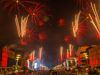 Fireworks and a drone show light up the midnight sky over Lusail Boulevard during the 2025 New Year's Day celebrations in Doha, Qatar, on Ja...