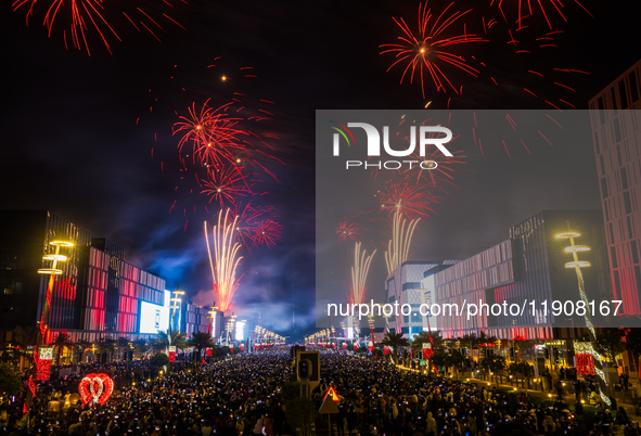 Fireworks and a drone show light up the midnight sky over Lusail Boulevard during the 2025 New Year's Day celebrations in Doha, Qatar, on Ja...