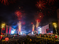 Fireworks and a drone show light up the midnight sky over Lusail Boulevard during the 2025 New Year's Day celebrations in Doha, Qatar, on Ja...