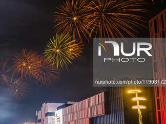 Fireworks and a drone show light up the midnight sky over Lusail Boulevard during the 2025 New Year's Day celebrations in Doha, Qatar, on Ja...