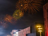 Fireworks and a drone show light up the midnight sky over Lusail Boulevard during the 2025 New Year's Day celebrations in Doha, Qatar, on Ja...