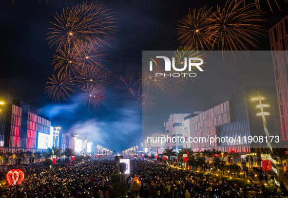 Fireworks and a drone show light up the midnight sky over Lusail Boulevard during the 2025 New Year's Day celebrations in Doha, Qatar, on Ja...