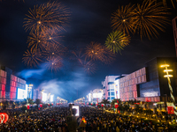 Fireworks and a drone show light up the midnight sky over Lusail Boulevard during the 2025 New Year's Day celebrations in Doha, Qatar, on Ja...