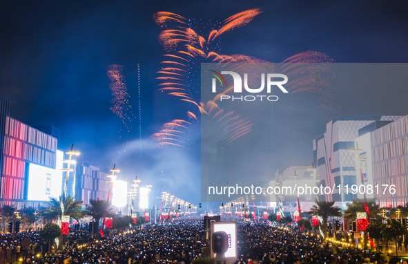 Fireworks and a drone show light up the midnight sky over Lusail Boulevard during the 2025 New Year's Day celebrations in Doha, Qatar, on Ja...