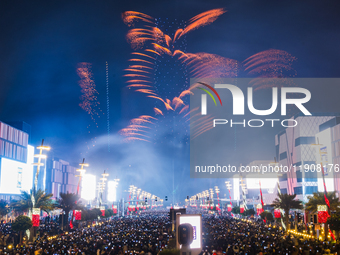 Fireworks and a drone show light up the midnight sky over Lusail Boulevard during the 2025 New Year's Day celebrations in Doha, Qatar, on Ja...