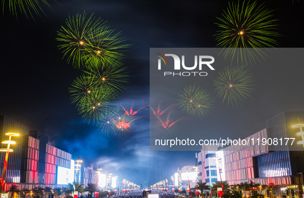 Fireworks and a drone show light up the midnight sky over Lusail Boulevard during the 2025 New Year's Day celebrations in Doha, Qatar, on Ja...