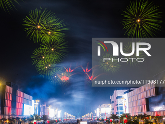 Fireworks and a drone show light up the midnight sky over Lusail Boulevard during the 2025 New Year's Day celebrations in Doha, Qatar, on Ja...