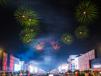 Fireworks and a drone show light up the midnight sky over Lusail Boulevard during the 2025 New Year's Day celebrations in Doha, Qatar, on Ja...