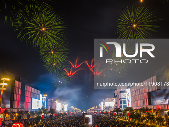 Fireworks and a drone show light up the midnight sky over Lusail Boulevard during the 2025 New Year's Day celebrations in Doha, Qatar, on Ja...