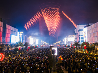 Fireworks and a drone show light up the midnight sky over Lusail Boulevard during the 2025 New Year's Day celebrations in Doha, Qatar, on Ja...