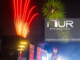 Fireworks and a drone show light up the midnight sky over Lusail Boulevard during the 2025 New Year's Day celebrations in Doha, Qatar, on Ja...