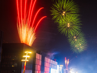 Fireworks and a drone show light up the midnight sky over Lusail Boulevard during the 2025 New Year's Day celebrations in Doha, Qatar, on Ja...