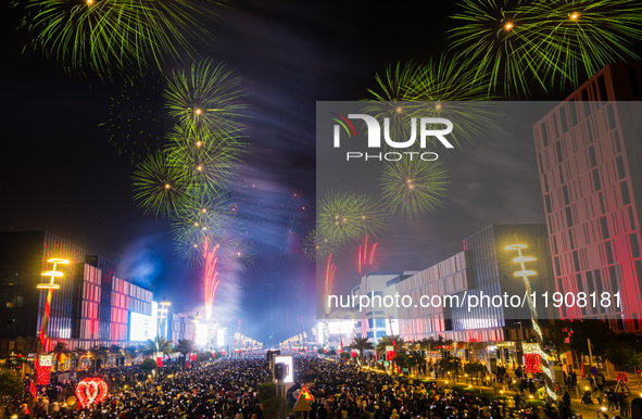 Fireworks and a drone show light up the midnight sky over Lusail Boulevard during the 2025 New Year's Day celebrations in Doha, Qatar, on Ja...