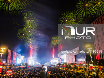 Fireworks and a drone show light up the midnight sky over Lusail Boulevard during the 2025 New Year's Day celebrations in Doha, Qatar, on Ja...