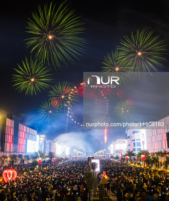 Fireworks and a drone show light up the midnight sky over Lusail Boulevard during the 2025 New Year's Day celebrations in Doha, Qatar, on Ja...